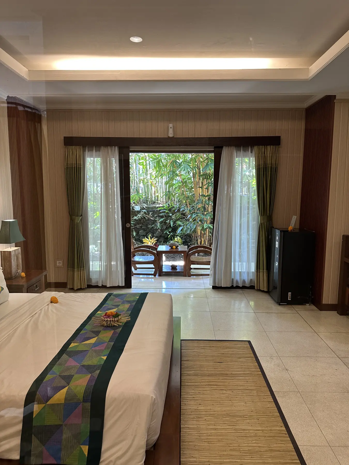 Junior Suite bedroom looking toward its tropical private terrace